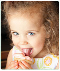 Bliss Cupcake Café Little Girl Licking Cupcake